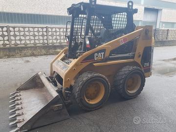 MINIPALA CATERPILLAR 216 + accessori