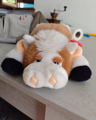 Peluche mucca Trudi sdraiata con cartellino