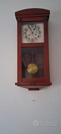 Orologio a pendolo da parete