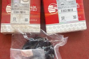 Coppia piattelli reggimolla ammortizzatore opel