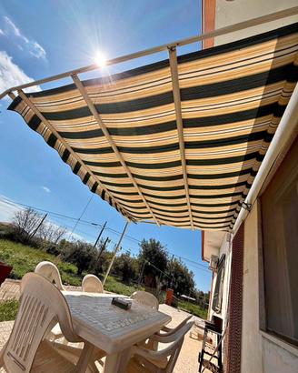 Pergolato con tenda artigianale resistente