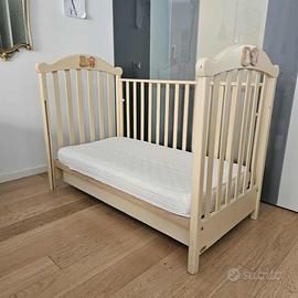 Lettino/culla in legno con funzione dondolo, spond