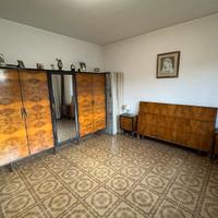 Camera matrimoniale in radica del 1950