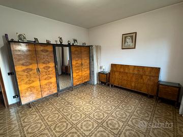 Camera matrimoniale in radica del 1950