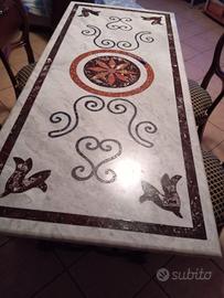 tavolo in marmo con piedi in ferro battuto 