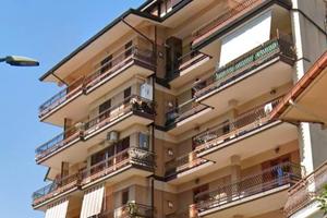 Appartamento con ampio terrazzo e box auto