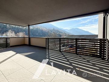 Quadrilocale con terrazza e giardino a Montagna