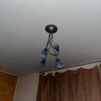 Lampadario di design in ferro .