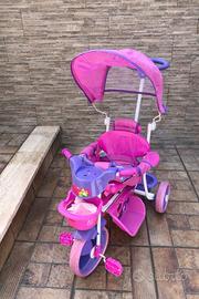 Trciclo per bambina con maniglione e cappottina