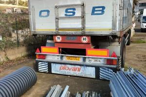 Rimorchio ribaltabile bilaterale