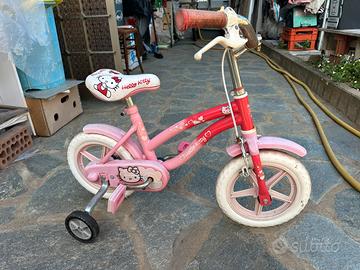 Bicicletta bambina Hello Kitty 12" con rotelle