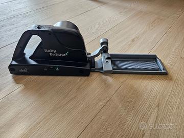 Passeggino, dispitivo per dondolio automatico.