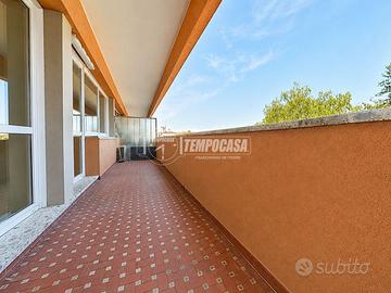 BILOCALE CON TERRAZZO E POSTO AUTO