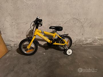 Bici a pedali e rotelle