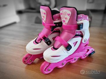 Pattini a 4 ruote regolabili con freno posteriore