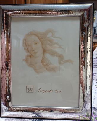 Cornice in argento