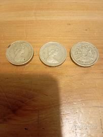 tre monete da 1 sterlina 