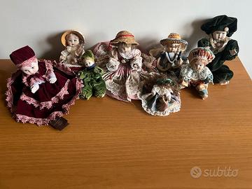 Collezione di bambole in ceramica, una Capodimonte