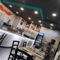 Pizzeria con tavoli asporto e domicilio