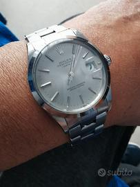 ROLEX  REF. 1500  (OYSTER PERPETUAL DATE ).