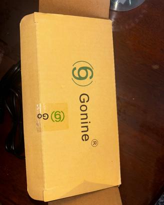 Alimentatore Gonine per fotocamera digitale nuovo