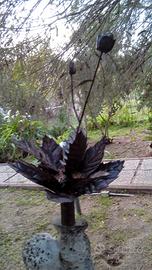 rosone con rosa in ferro battuto  