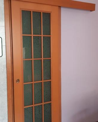 Porta scorrevole a telaio esterno