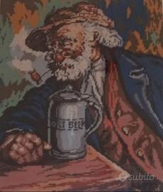 "Anziano con pipa e boccale di birra"