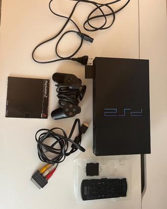 Playstation 2 con videogiochi e pistola per gioco