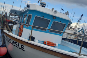 Barca da pesca con licenza e pescaturismo