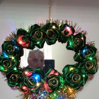 Corona con specchio per la porta