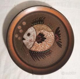 Piatti decorativi in ceramica dipinta a mano