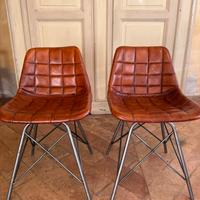 Coppia sedie in pelle con base in ferro