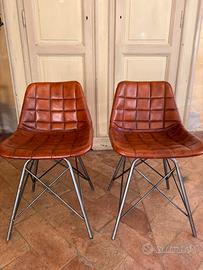 Coppia sedie in pelle con base in ferro
