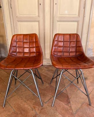 Coppia sedie in pelle con base in ferro