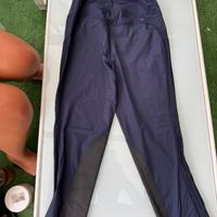 Pantaloni e maglia da equitazione