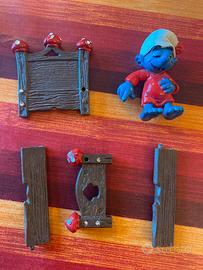 Puffo che dorme con pezzi mancanti