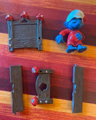 Puffo che dorme con pezzi mancanti