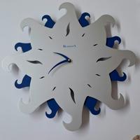 orologio da parete a forma di sole  Meridiana 