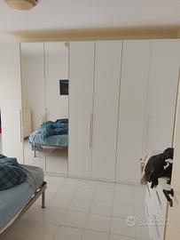 armadio 7 ante cassettiere specchio e comodini