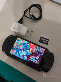 Sony PSP Slim 2004 + gioco + adattatore