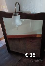 Specchio con cornice in legno