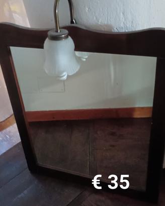 Specchio con cornice in legno