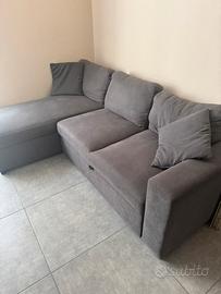 Divano angolare grigio con letto estraibile