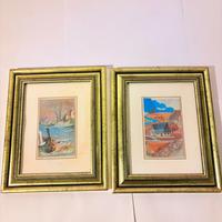 Coppia di dipinti con cornici dorate