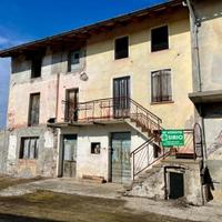 Casa da ristrutturare con ampio terreno