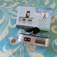 Bilancia borsa e valigie