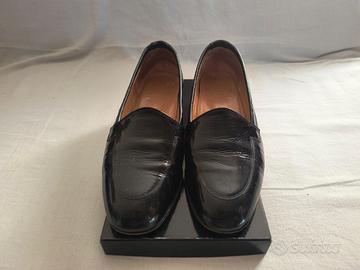 Scarpe nere lucide invernali