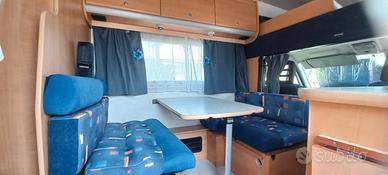 camper matrimoniale in coda e grande garage