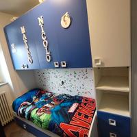 Cameretta bambini a ponte con due letti